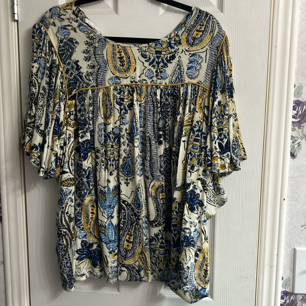 Paisley, print cream and color with blue and gold Paisley print